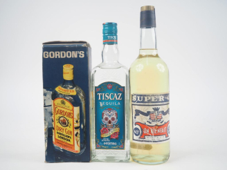 Vente aux enchères 3 BOUTEILLES : 1 GIN GORDON'S COFFRET - 1 TEQULA TISCAZ - 1 SUPER 45