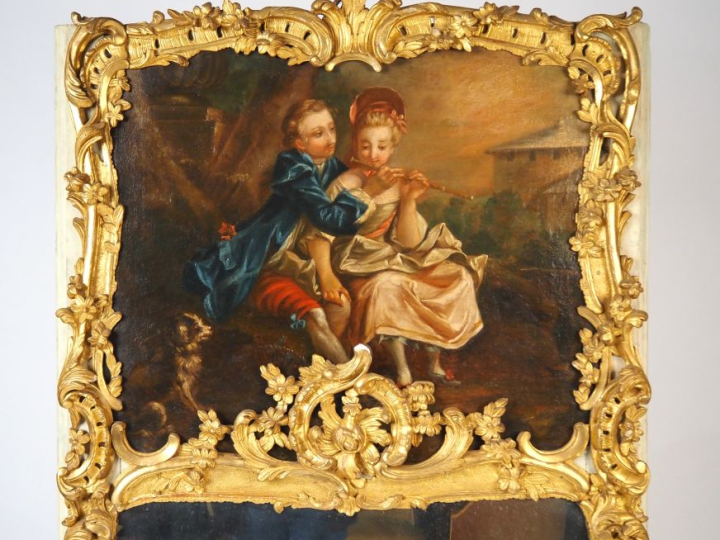 Grand trumeau fin XVIIIème, cadre en bois sculpté, doré et ajouré, à d