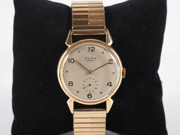 HUMA, Genève Montre bracelet, boitier en or jaune 750.  Cadran rond à 