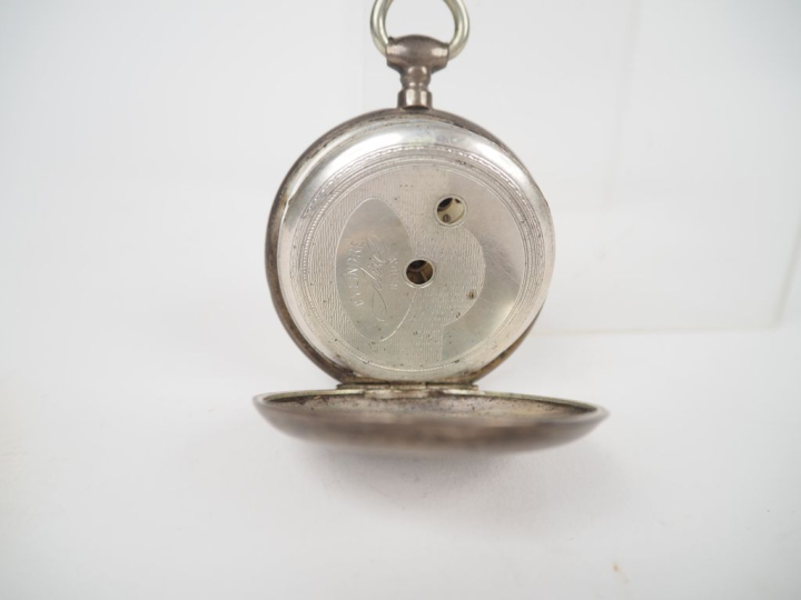 Porte-montre Napoléon III de style Louis XV en bois sculpté et doré à 