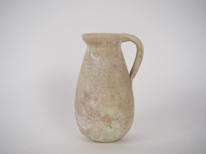 Céramique romaine. Cruche piriforme en céramique beige. 18 cm Expert :