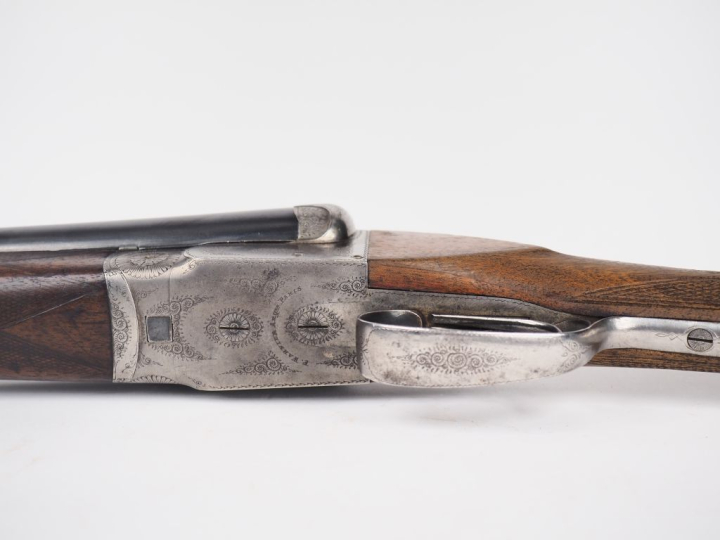 Fusil juxtaposé en calibre 12/65 systéme Anson et Delay à éjecteurs. C
