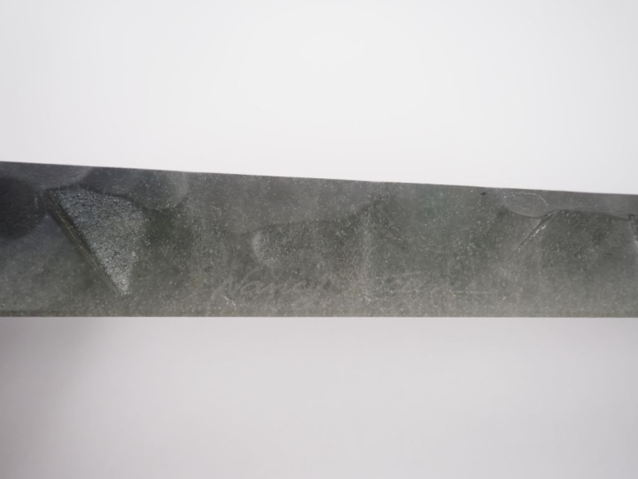 NANCY France.  Presse papier en pâte de verre brune en forme de hache 