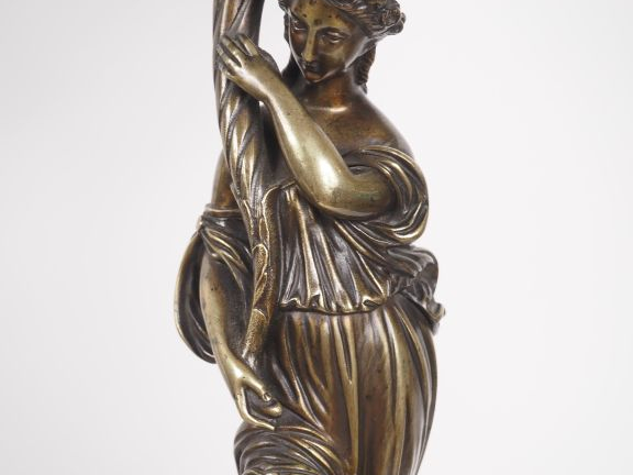 Garniture de cheminée Napoléon III , la pendule ornée d'un groupe figu