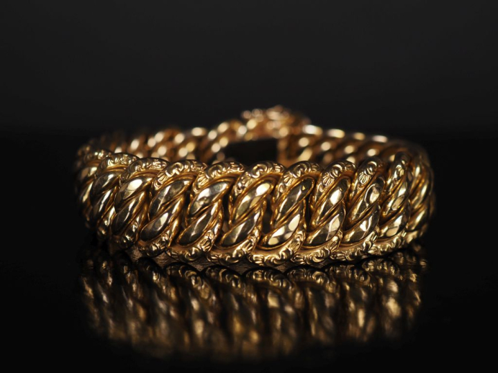 Bracelet articulé en or jaune 750, maille américaine.  Chainette de sé