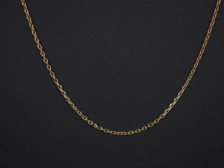 Chaine en or jaune 750, maille forçat.  Long. 62,8 cm Poids. 4,25 g