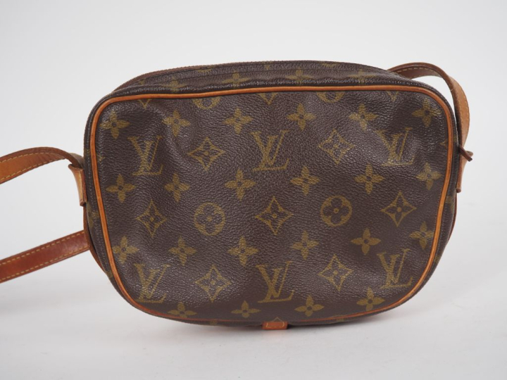 LOUIS VUITTON  Sac JEUNE FILLE (c 1975). Toile enduite monogramée et v