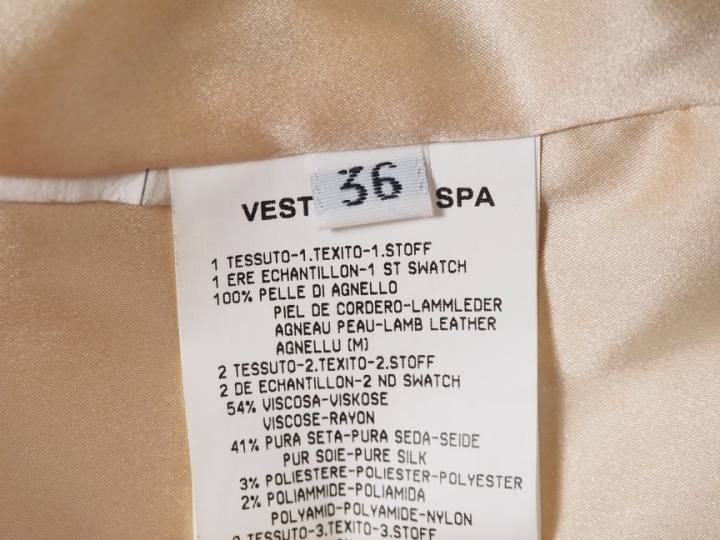 Emanuel UNGARO, Paris Veste cintrée bi-matière en cuir et tissu.  Bord