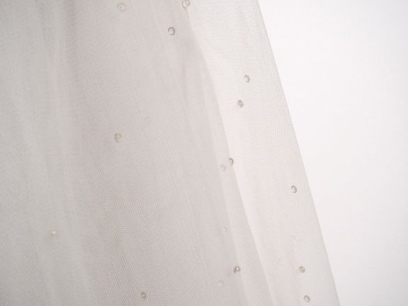 ZAPA Jupe longue blanche en nylon agrémenté de petits cabochons transp