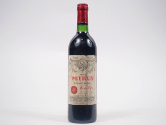 Vente aux enchères 1 BOUTEILLE PETRUS POMEROL - 1983 - ES/CAPS ABIMÉE 