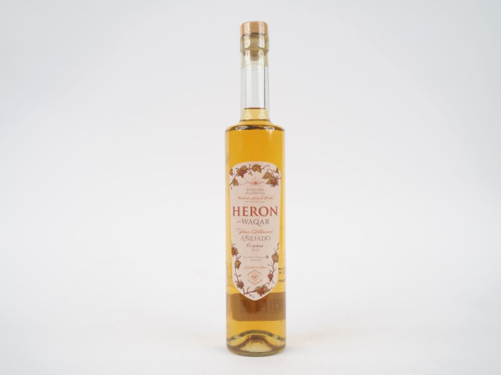 1 BOUTEILLE HERON WAQAR 6 ANS D'ÂGE LIMITED EDITION D.O 