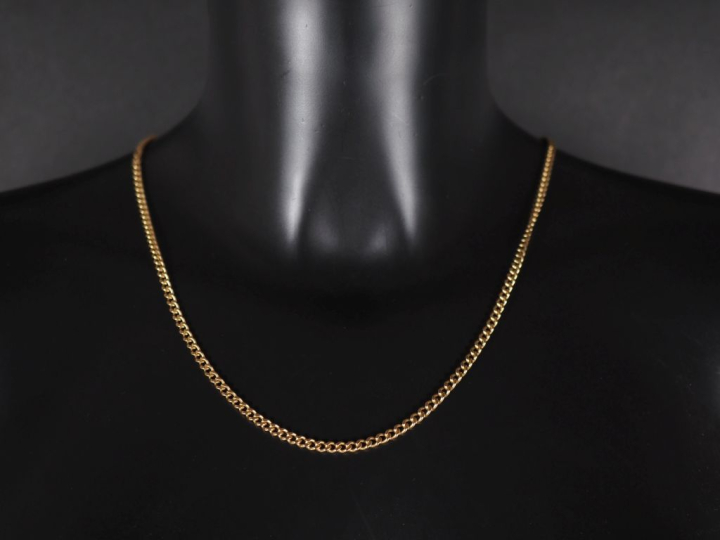 Collier souple en or jaune 750, maille gourmette. Long. 56,5 cm Poids.