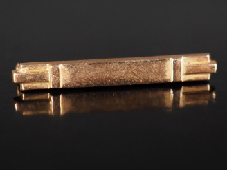 Vente aux enchères Petite broche barrette de style Art déco en or jaune 750.  Long. 2,8 c