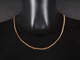 Vente aux enchères Collier souple en or jaune 750, maille dite tubogaz.  Long. 50,5 cm Po