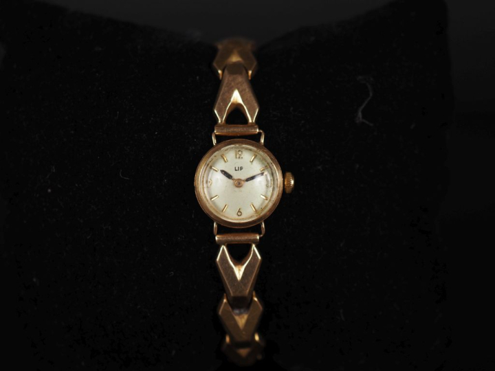 LIP Numéro 24119 Montre bracelet de dame, boitier et bracelet en or ja