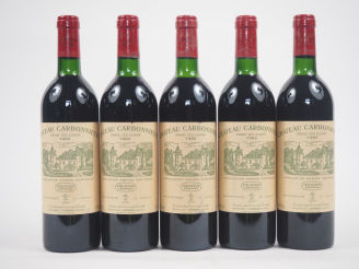 Vente aux enchères 5 BOUTEILLES CHÂTEAU CARBONNIEUX GCC GRAVES - 1985 - 3 BG/2 LB/1 CAPSU
