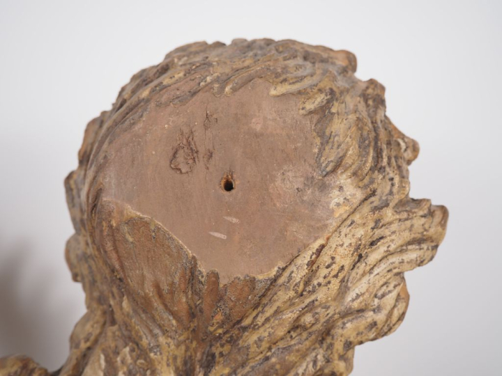 Buste de saint Sébastien en bois sculpté et polychromé. Tête à la chev