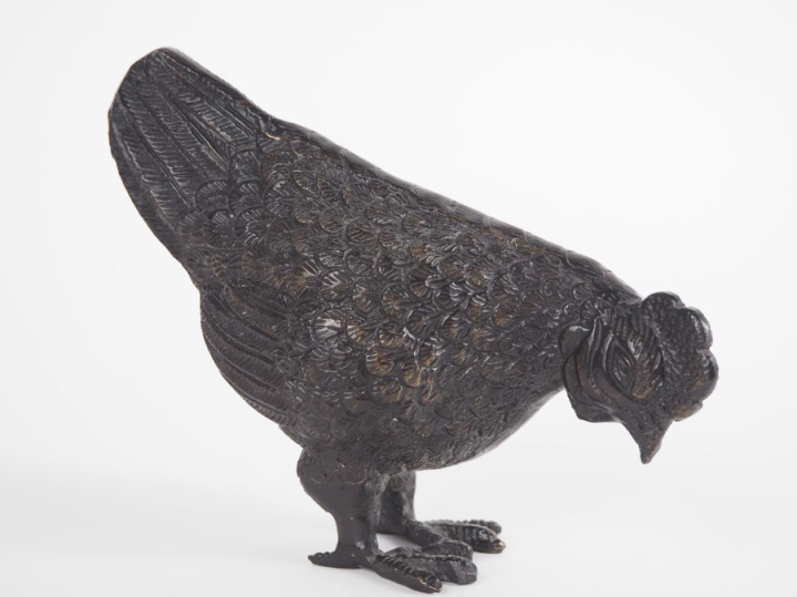 Sujet en métal patiné, "poule faisane". Dim. 14 x 17 cm.