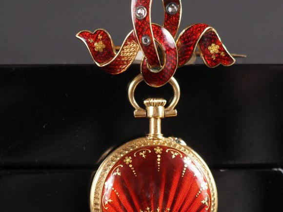 Ravissante montre de col Napoléon III et une broche en or jaune 750.  